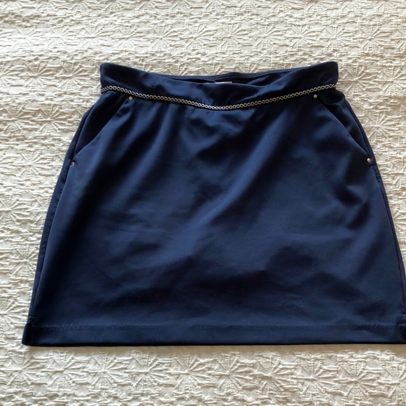 Great Greg Norman navy skort with navy and silver braid around waistband. - Picture 1 of 15